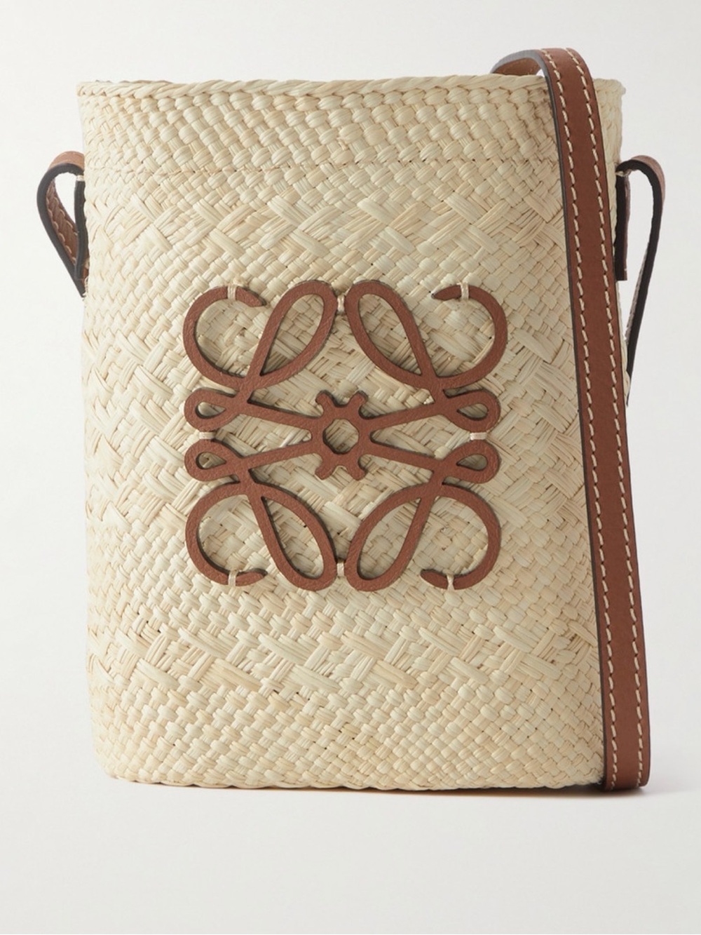 Loewe Paula’s Ibiza Leather Trimmed Raffia Bucket Bag